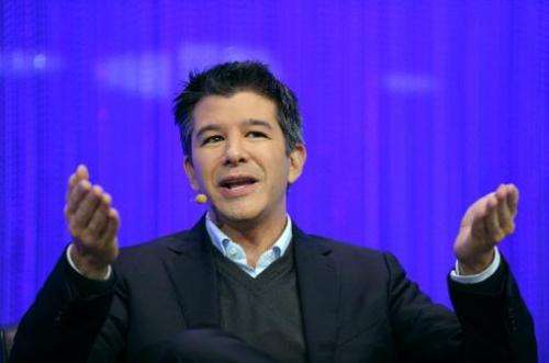 Travis Kalanick, co-founder and CEO of Uber, speaking during a session of the LeWeb 2013 event in Saint-Denis near Paris