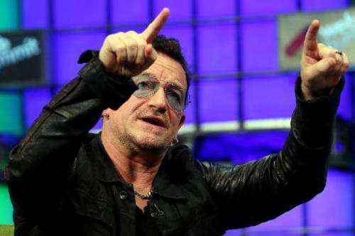 U2 frontman Bono speaks on centre stage during the last day of the Web Summit in Dublin, Ireland, on November 6, 2014