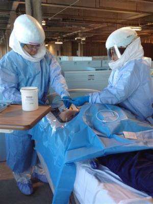 US Ebola training focuses on astronaut-like gear