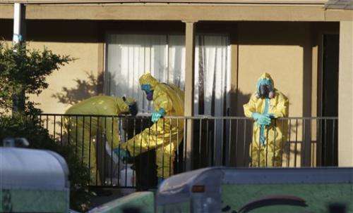 US orders agents to monitor travelers for Ebola