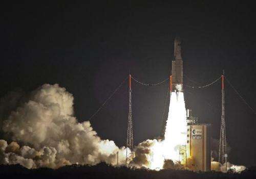 Picture taken and released on July 29, 2014 by the European Space Agency (ESA) shows an Ariane 5 ES heavy rocket carrying the Au