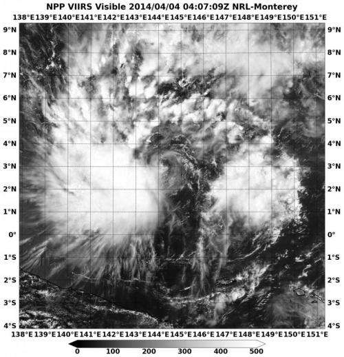 NASA sees Tropical Depression 05W's bulk west of center