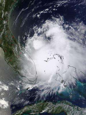 NASA's TRMM satellite spots heavy rainfall around Tropical Storm Arthur's center