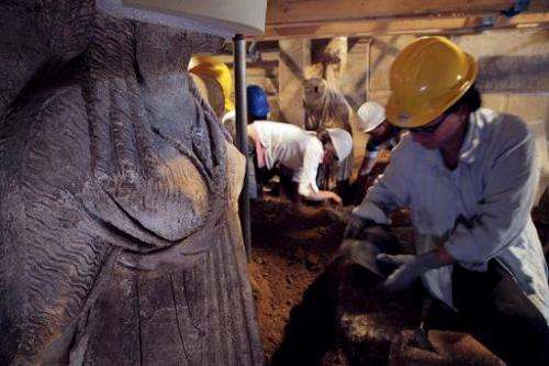 This handout picture released by the Greek Ministry of Culture on September 11, 2014 shows archaeologists working next to Caryat