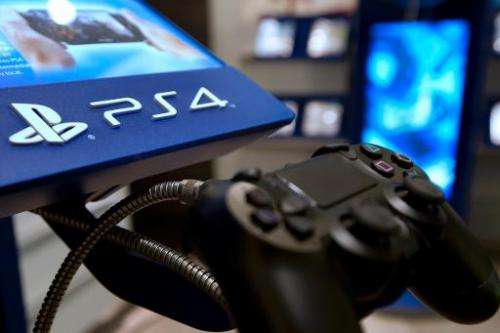 A picture taken on November 29, 2013 in a Parisian store shows the joystick of the Sony Playstation 4 video game console (PS4)