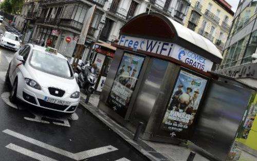 A picture taken on July 3, 2014 shows an advertisement for wifi provider Gowex on a news kiosk in Madrid