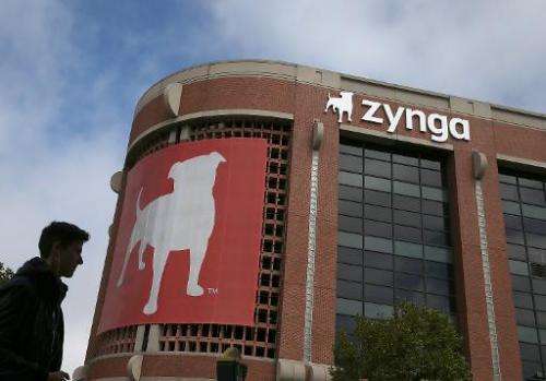 A pedestrian walks by the Zynga headquarters on July 25, 2013 in San Francisco, California