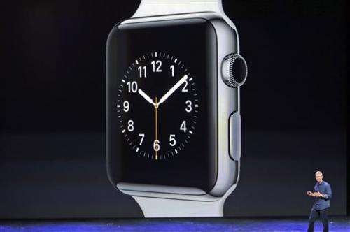 Apple reveals larger iPhones and smartwatch