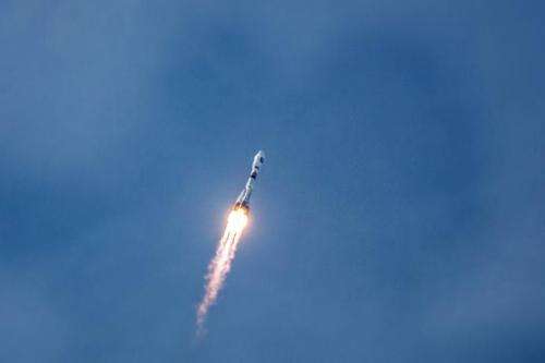 A Soyuz rocket carrying a pair of Galileo In-Orbit Validation satellites lifts off from Europe's Spaceport in Sinnamary, 12km f