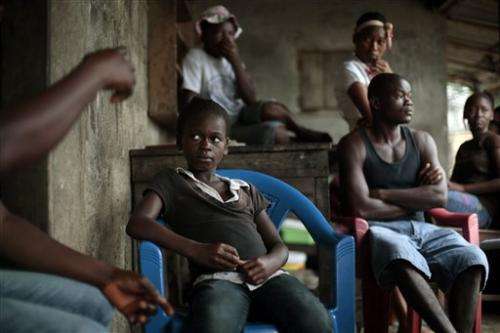 Families wait in agony for word on Ebola patients