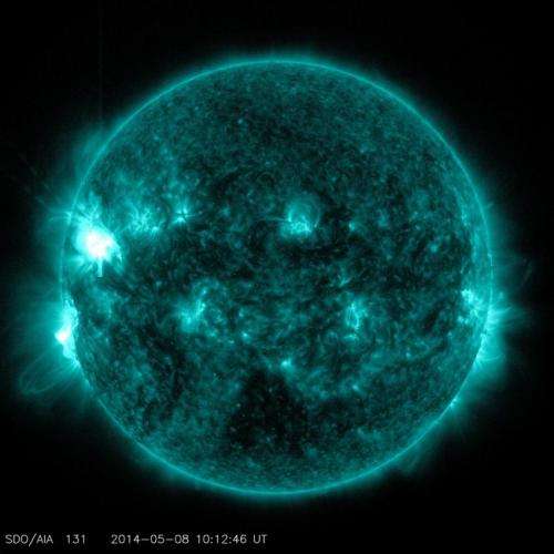 Mid-level solar flare erupts from the sun