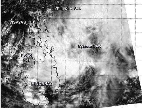 NASA's Aqua satellite sees Tropical System 94W affecting Philippines