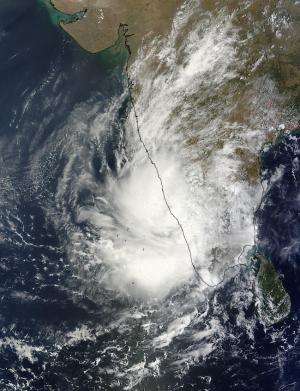 NASA sees system 91B lingering over southwestern India