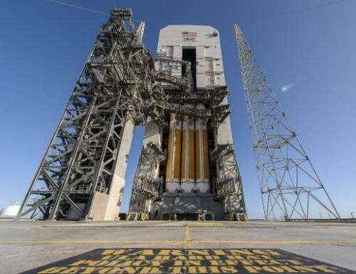 NASA's Orion spacecraft, mounted atop a United Launch Alliance Delta IV Heavy rocket, is visible inside the Mobile Service Towe