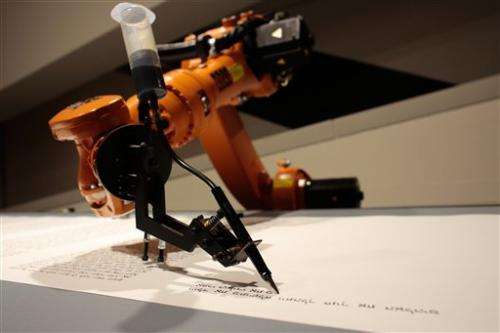 Robot writes Torah at Berlin's Jewish Museum