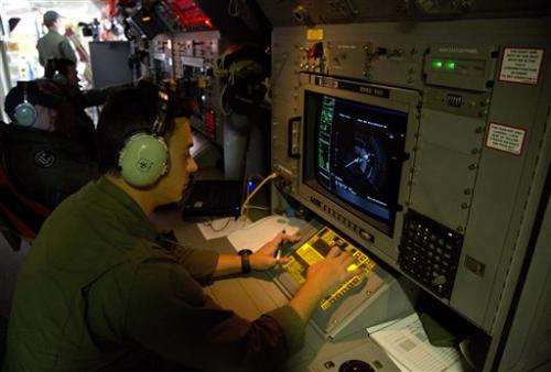 Technology hindered, helped search for Flight 370