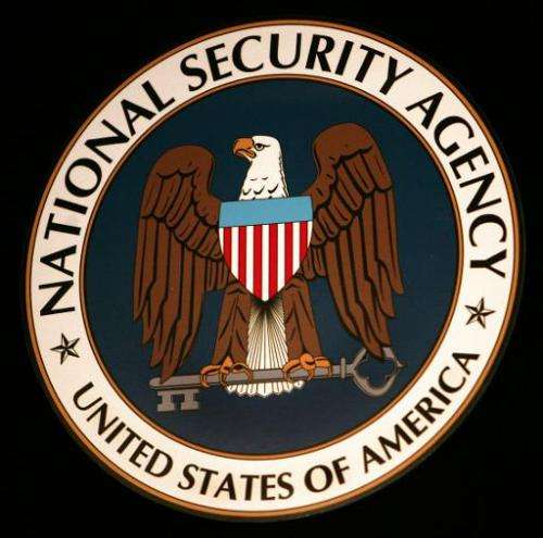 The logo of the National Security Agency hangs at the Threat Operations Center in Fort Meade, Maryland on January 25, 2006