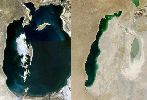This combination of NASA satellite images shows the Aral Sea in 2008 (L) and as of September 22, 2013 (R), lying between Kazakhs