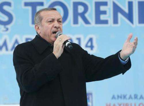 Turkey's Prime Minister Recep Tayyip Erdogan delivers a speech in Ankara March 13, 2014