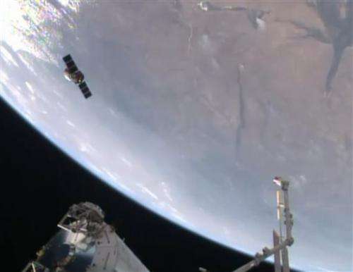 Space station supply ship exits, now packing trash