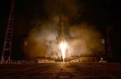 A Russian Soyuz rocket is seen blasting off from a launch pad at the Russian-leased Baikonur cosmodrome in Kazakhstan, on March 
