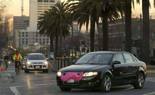 California prosecutors sue Uber; Lyft settles