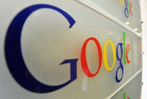 Google logo is seen on a wall at the entrance of the Google offices in Brussels on February 5, 2014