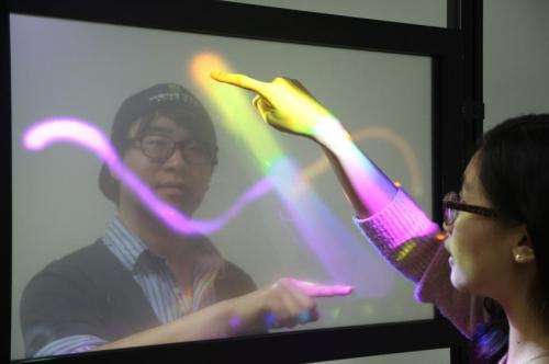 KAIST develops TransWall, a transparent touchable display wall