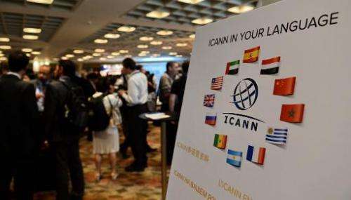 Participants take a break during the Internet Corporation for Assigned Names and Domain (ICANN) meeting in Singapore on March 24