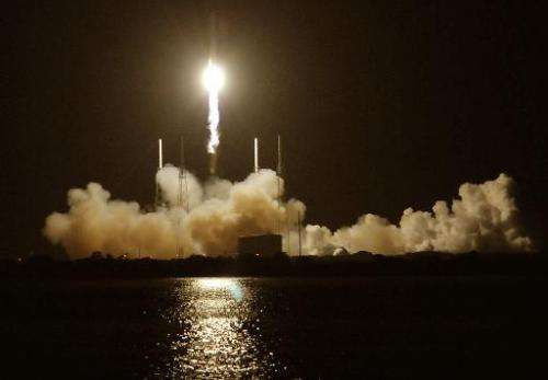 SpaceX's Falcon 9 rocket blasts off from Pad 40 at Cape Canaveral, Florida on October 7, 2012 as it heads for space carrying the