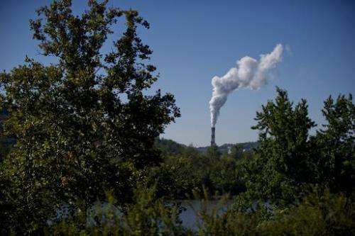 A plume of exhaust extends from a coal-fired power plant located southwest of Pittsburgh, Pennsylvania, on September 24, 2013