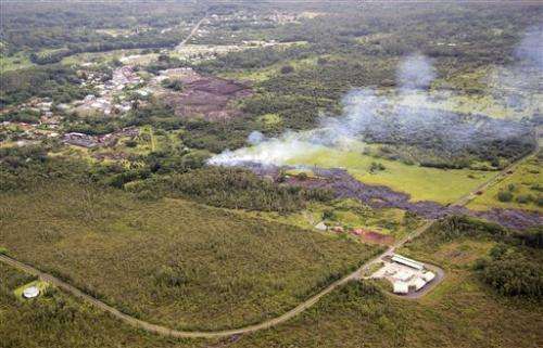 Lava burns shed, creeps toward homes in Hawaii