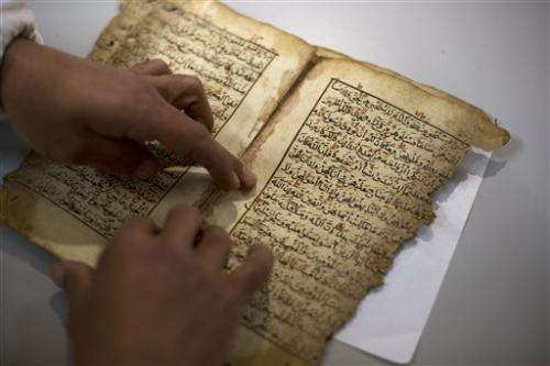 Old manuscripts get face-lift at Jerusalem mosque