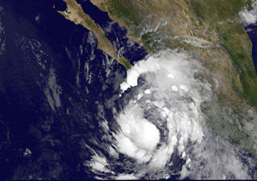 Satellite sees Tropical Storm Simon crawling up Western Mexico's coastline