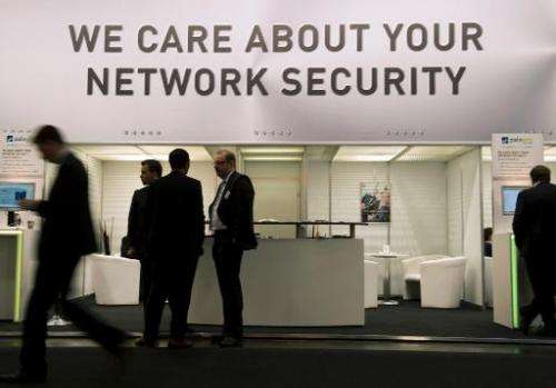 In this file photo, a stand offering security solutions for the internet is seen at the CeBIT computer technology trade fair in 