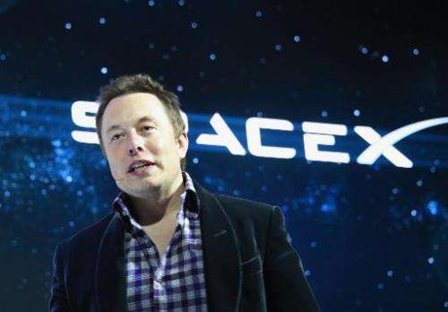 SpaceX CEO Elon Musk unveils SpaceX's new seven-seat Dragon V2 spacecraft, in Hawthorne, California on May 29, 2014