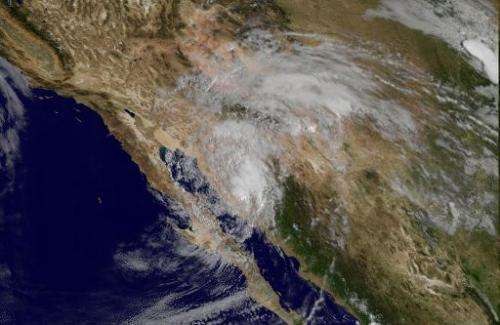 This September 17, 2014 NASA GOES satellite image shows Tropical Storm Odile pushing up from Mexico into the southwestern US