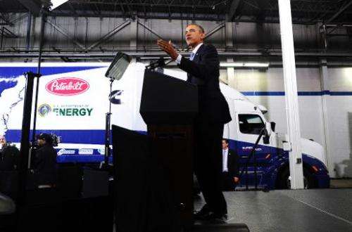 US President Barack Obama speaks on economy at the Safeway Distribution Center in Upper Marlboro, Maryland, on February 18, 2014