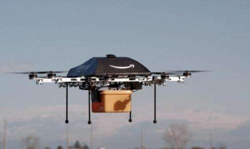 A handout photo released by Amazon on December 1, 2013 shows a flying &quot;octocopter&quot; mini-drone that would be used to fl