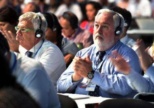 EU Commissioner for Energy and Climate Action Miguel Arias Canete, applauds during the seventh plenary meeting of the COP20 on D