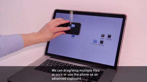 MIT groups develop smartphone system THAW that allows for direct interaction between devices