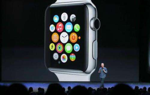 Apple CEO Tim Cook unveils the Apple Watch during a special event on September 9, 2014 in Cupertino, California