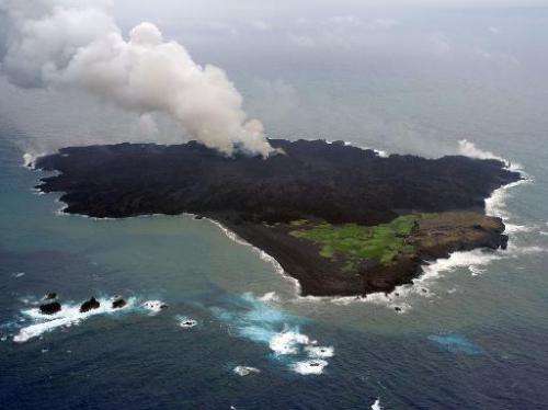 A handout photo taken by Japan Coast Guard on June 13, 2014 and received on August 19, 2014 shows the newly created volcanic Nis