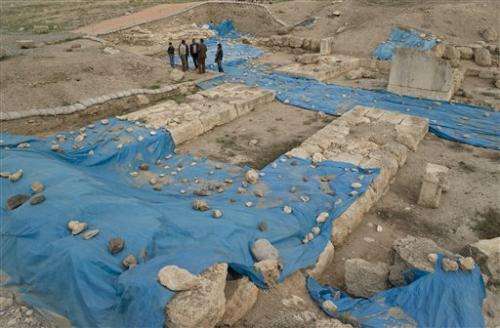 Archaeologists dig at ancient site near Syrian war