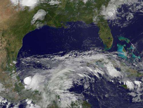 NASA and NOAA satellites eyeing Mexico's tropical soaker for development