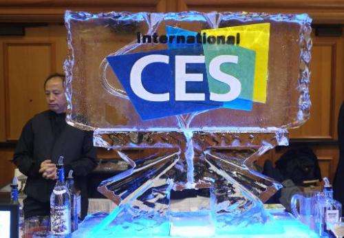 A bartender serves drinks during the first press event 'CES Unveiled' at the Mandalay Bay Convention Center prior to the 2014 In
