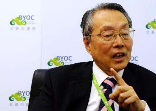 Acer's founder Stan Shih speaks during an interview with AFP in New Taipei City on June 5, 2014