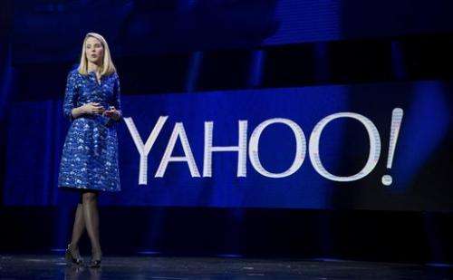 Activist investor pushes Yahoo to buy rival AOL