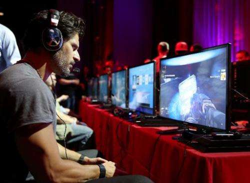Actor Joe Manganiello plays 'Destiny' at the game's launch in Seattle, Washington, on September 8, 2014