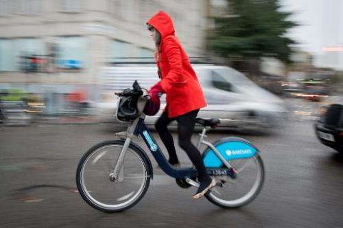 A cyclist rides on a Boris Bike in central London on November 20, 2013
